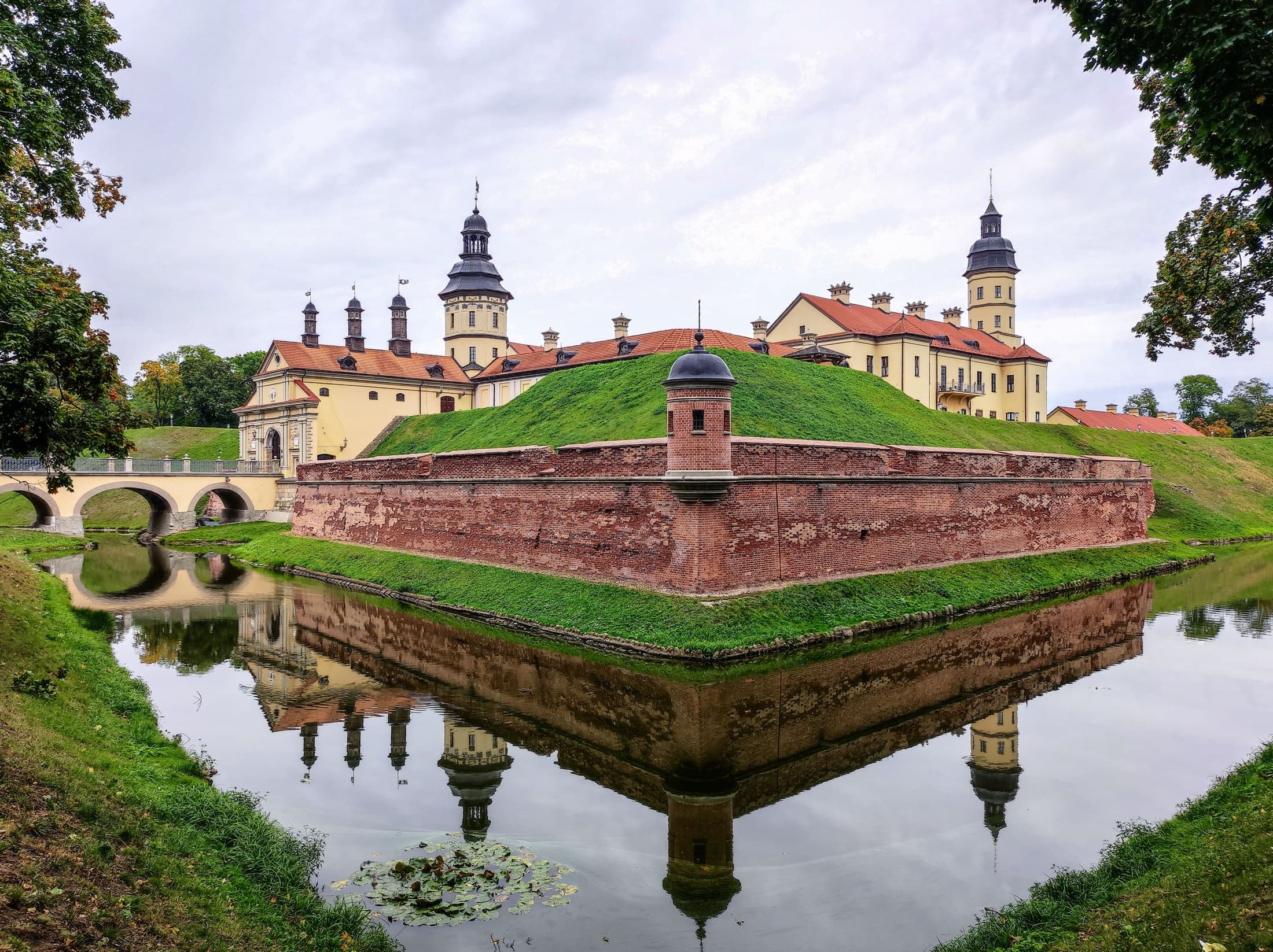 Nesvizh (Radziwill) Castle reflected in its moat