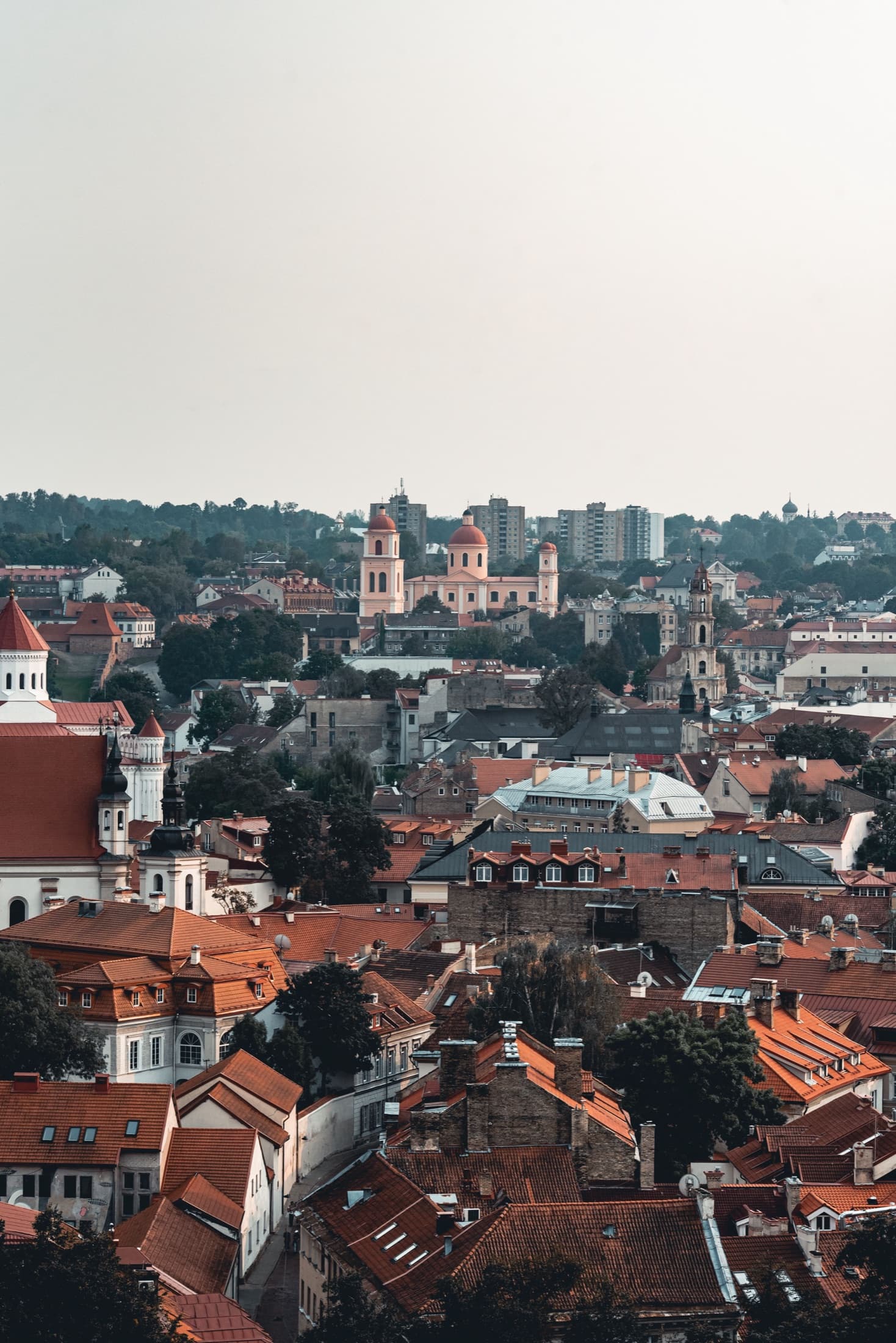 Aerial view of Vilnius Old Town's red rooftops and historic architecture