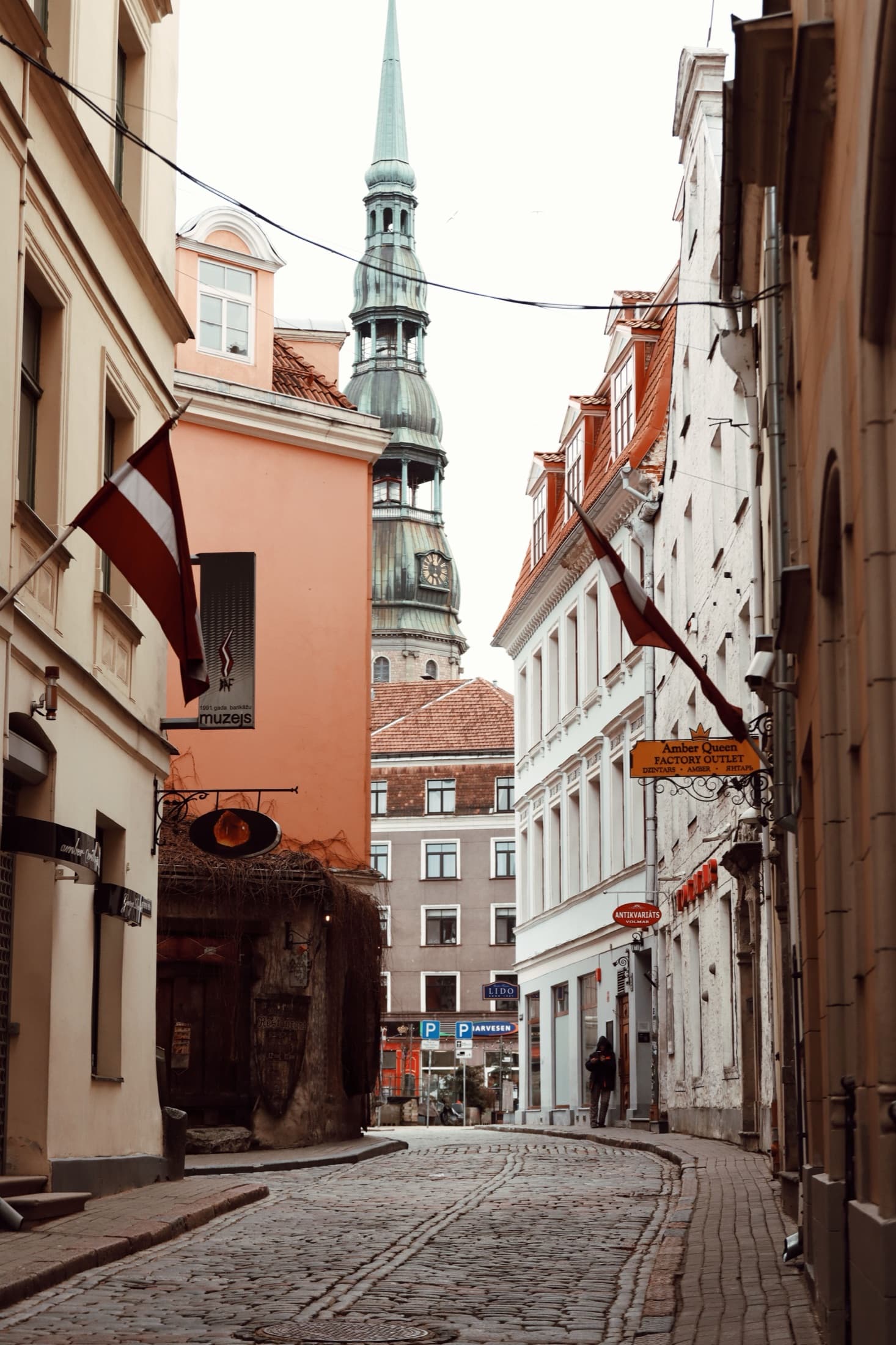 St. Peter's Church tower rising above the cobbled streets of Riga's Old Town