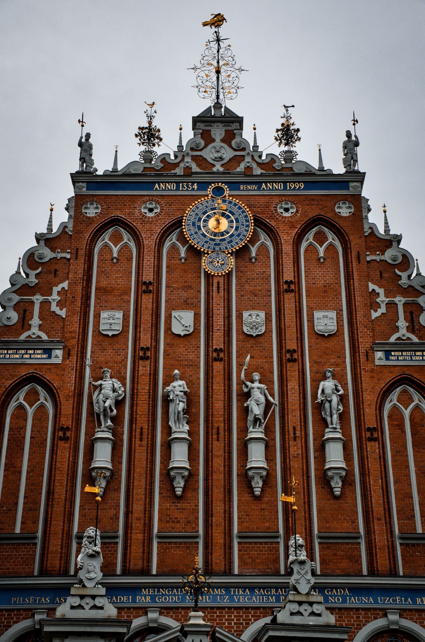 The ornate Gothic facade of the House of the Blackheads in Riga, with its statues