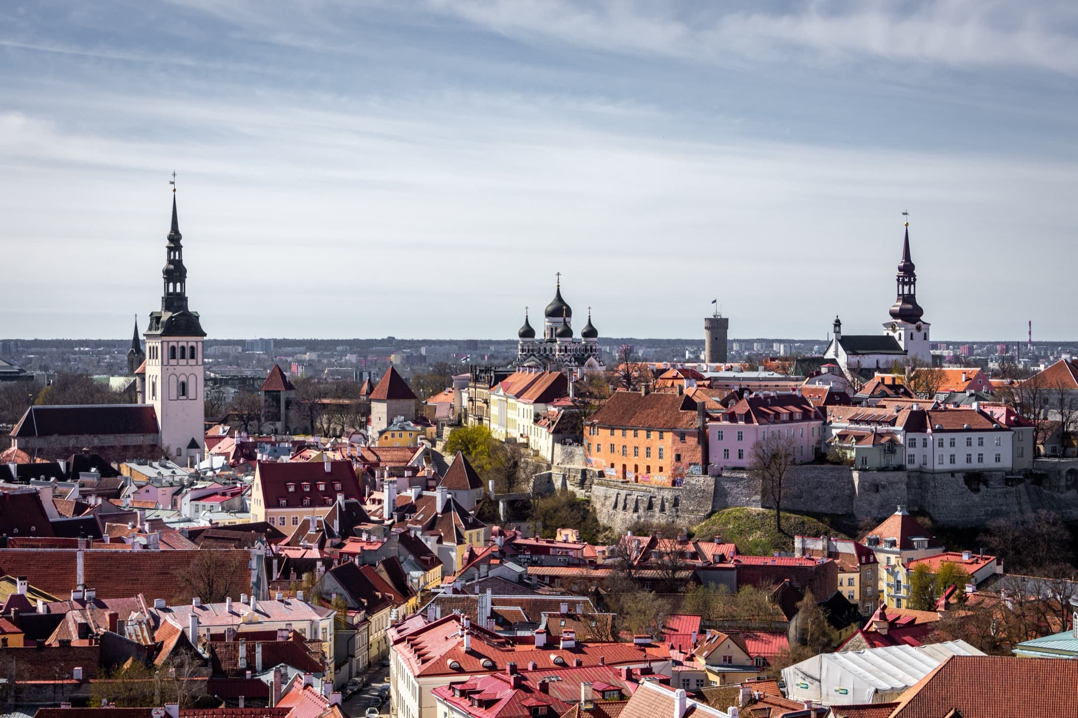 Panoramic aerial view of Tallinn's Old Town with its historic towers and rooftops