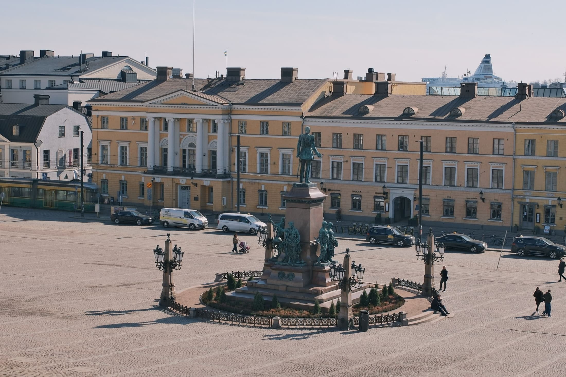 Aerial view of Senate Square in Helsinki featuring the Alexander II monument and Helsinki Cathedral