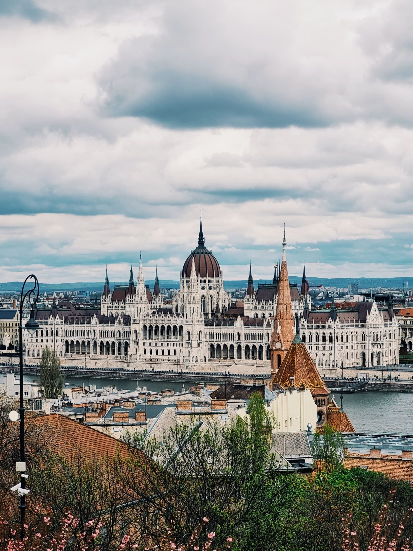 Aerial view of the Hungarian Parliament Building on a cloudy day