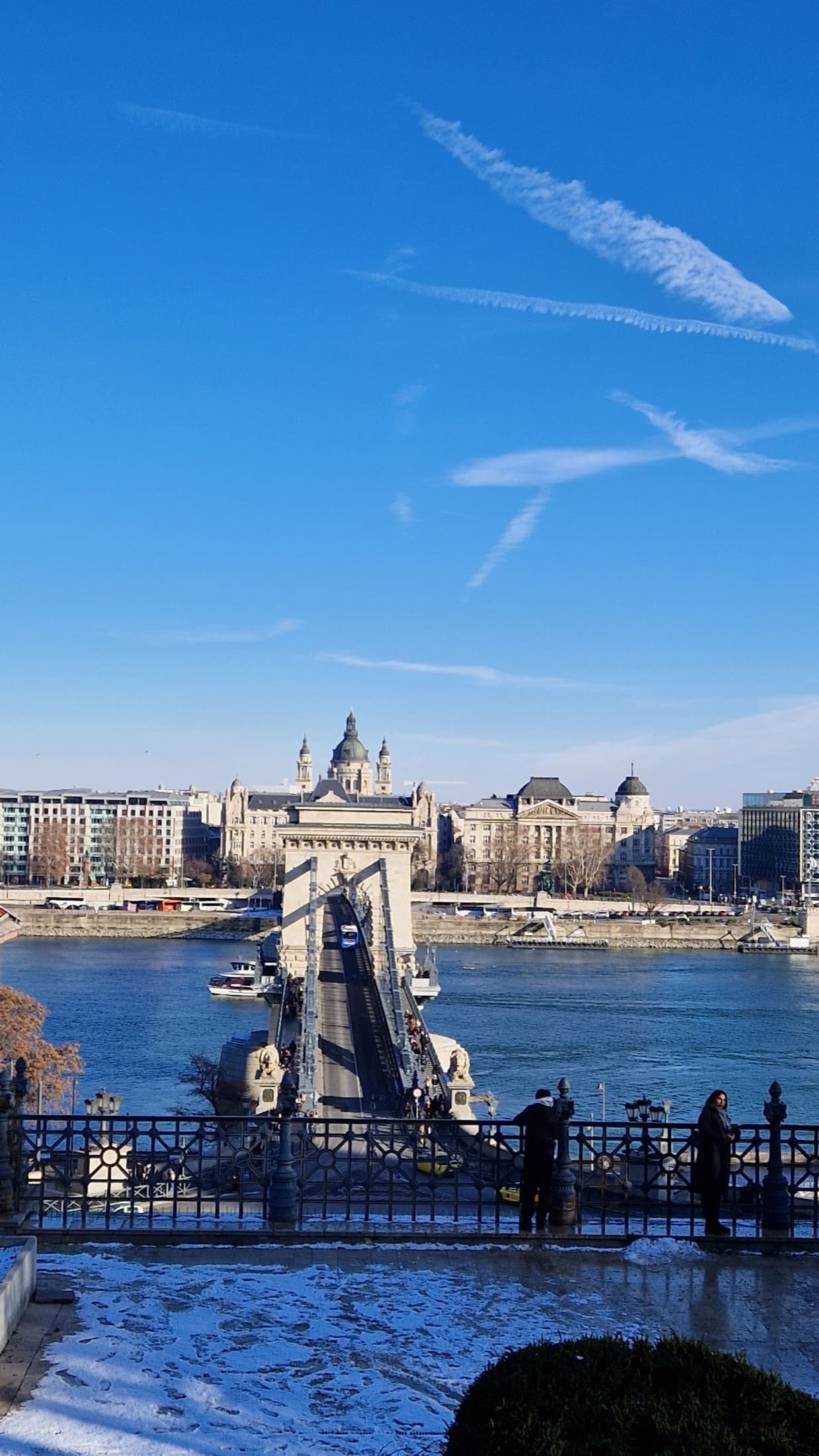 The Szechenyi Chain Bridge in Budapest under a clear blue sky
