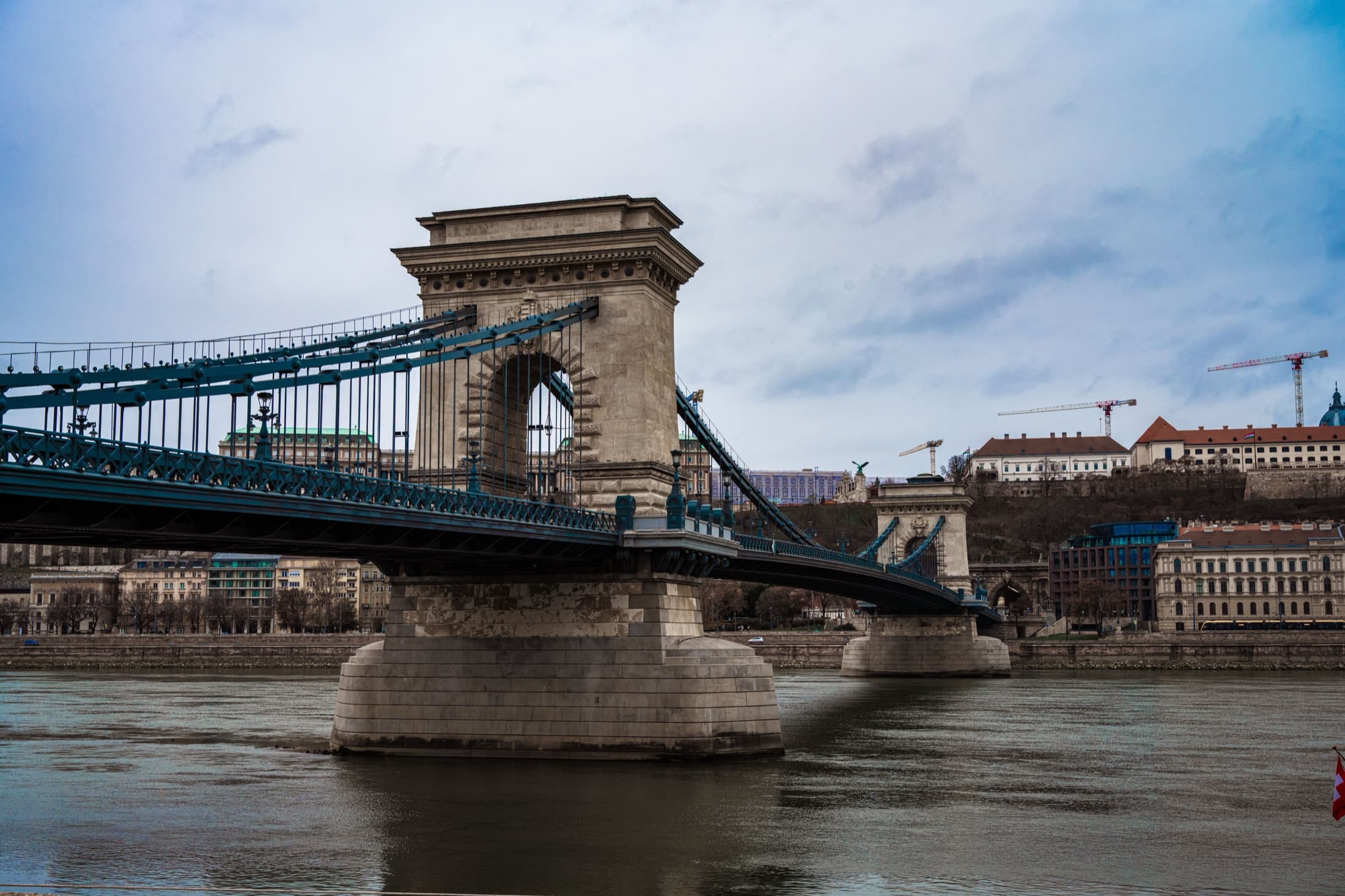 The famous Chain Bridge spanning the Danube River in Budapest in daylight