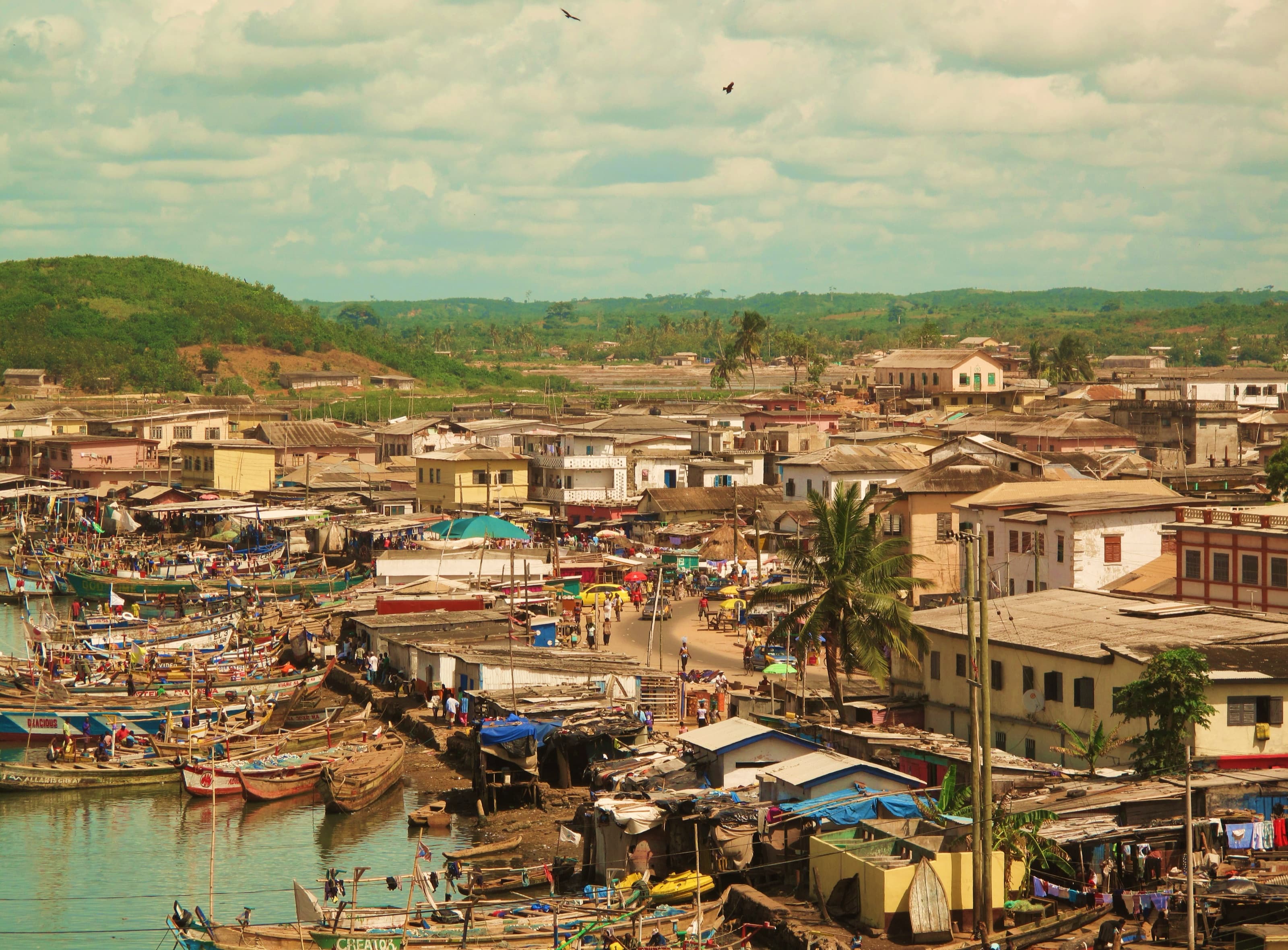 Fishing canoes crowd the harbour at Elmina on Ghana's central coast