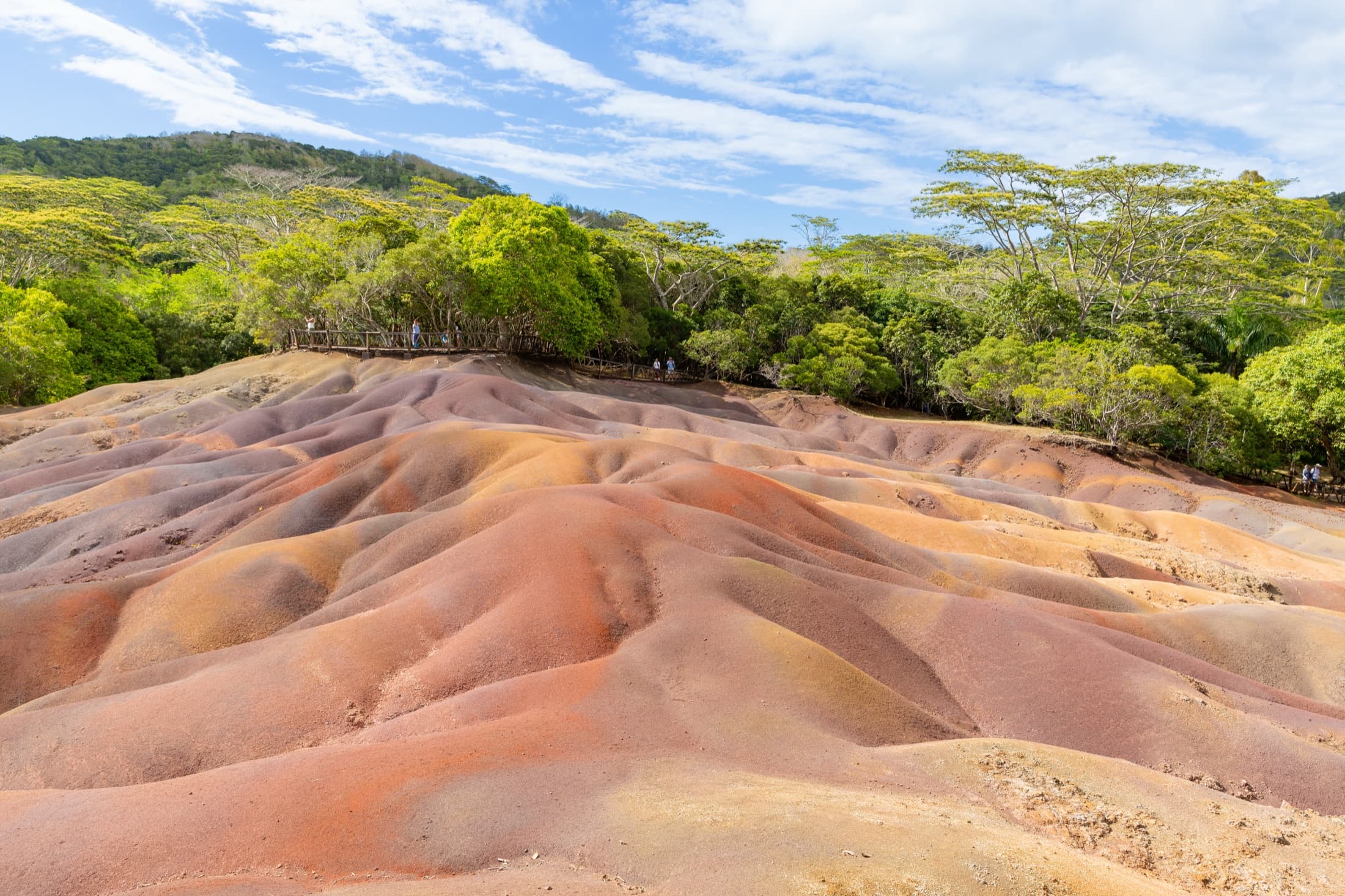 The multicolored sand dunes of the Seven Coloured Earths geopark in Chamarel, Mauritius